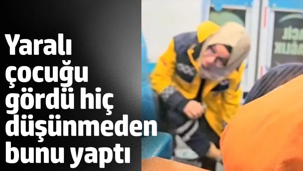 Acil tıp teknisyeni, yalın ayaklı çocuğa kendi çorabını giydirdi